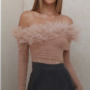 House of CB “Faith” Blush Off The Shoulder Feather Bodysuit
Size S.